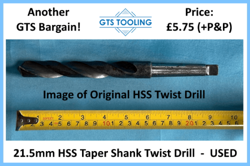 21.5mm HSS Twist Drill in Used Condition. Complete with Taper Shank. Showing full twist drill length alongside tape measure