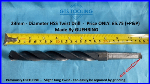 image showing the 23mm diameter twist drill's condition and length. Also shows the slight drills tang damage which can easily and quickly repaired by a quick grinding operation. Also shows the bargain price of this 23mm hss twist drill of £5.75 +p&p