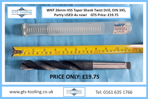 Image of 26mm twist drill showing the full length of the HSS twist with a tape measure in the photo. The image also shows the original plastic packaging the twist drill was supplied in. Price of the twist drill shows £19.75 from GTS-Tooling.co.uk