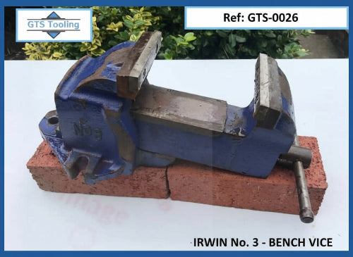 Image of an Irwin Number 3 Bench Vice. Mounted on a white table for viewing and inspection. Cleaned and Working OK