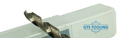 Image showing 1x cutting point of a precision twist drill, 3.8mm in diameter. Resting on its plastic container, showing the cutting edge of the drill.