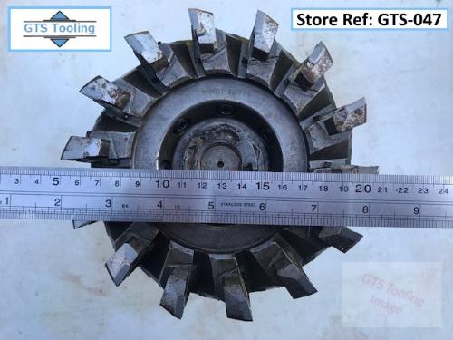 Image of a 150mm (6") Diameter, Heavy Duty Carbide Tipped Milling Cutter. With an engineers steel rule showing the precise diameter of the cutter head. Prices at £75 from GTS-Tooling.co.uk.