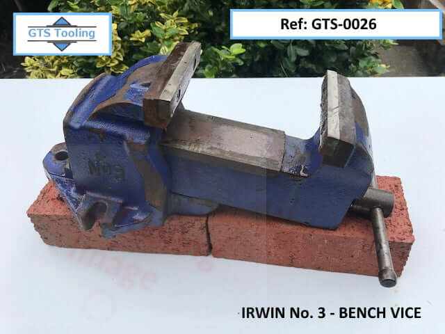 Image of an Irwin Number 3 Bench Vice. Mounted on a white table for viewing and inspection. Cleaned and Working OK